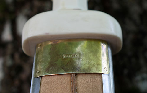 Reverse of the scabbard, with König's mark on the brass plate.
